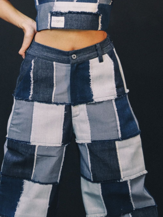 THE FRAYED DENIM PANTS
